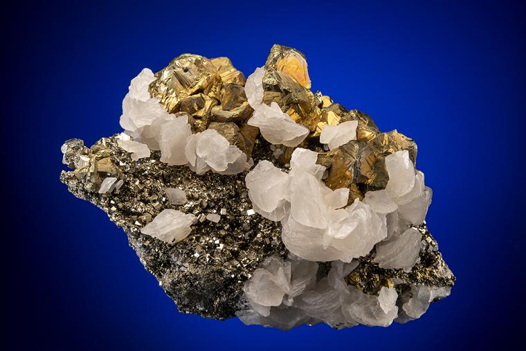 CHALCOPYRITE with CALCITE on PYRITE